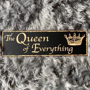 The Queen of Everything metal sign